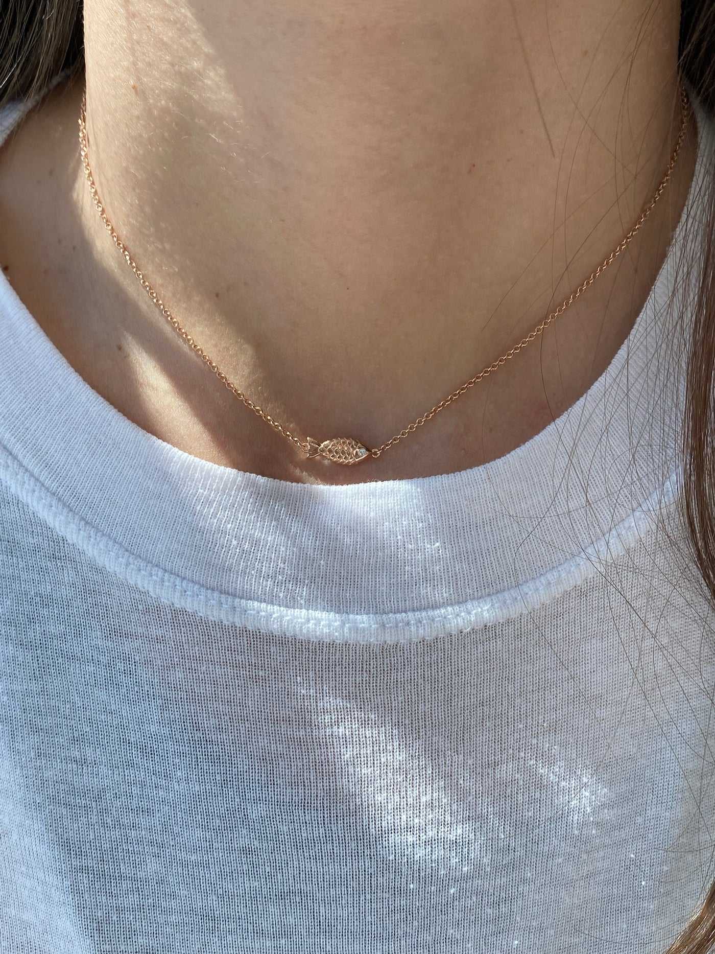 Gold fish necklace